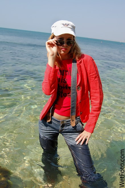 #113 - Wetlook by Cute Girl in Red Jacket, Jeans with Braces and Shoes