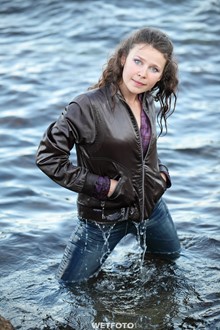 #235 - Wetlook by Beautiful Girl in Jacket and Tight Jeans on Sea
