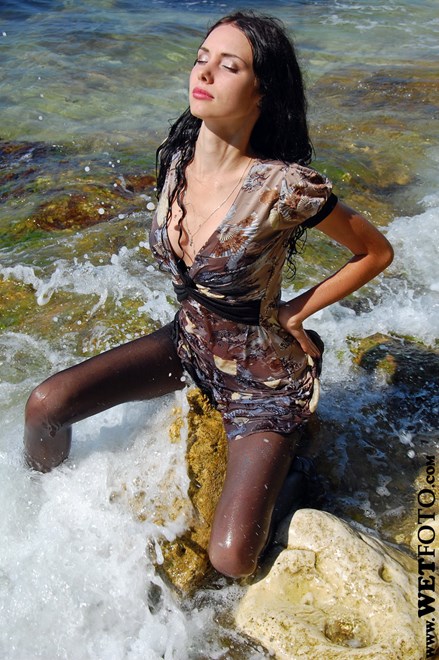 #28 - Wetlook by Beautiful Girl in Colored Dress, Stockings and High Heeled Sandals in Sea Waves