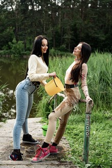 #700 - Two Girls Swims in the Lake Fully Clothed in Skinny Jeans and then Stay in Wet Pantyhose