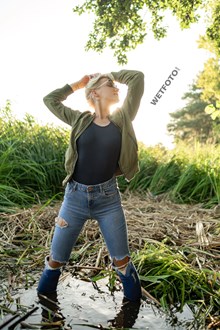 #703 - Hot Blonde in Tight Blue Jeans Gets Wet and Swims in the Lake