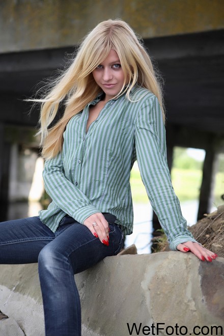 wet girl get wet wet hair fully clothed jeans shirt shoes river