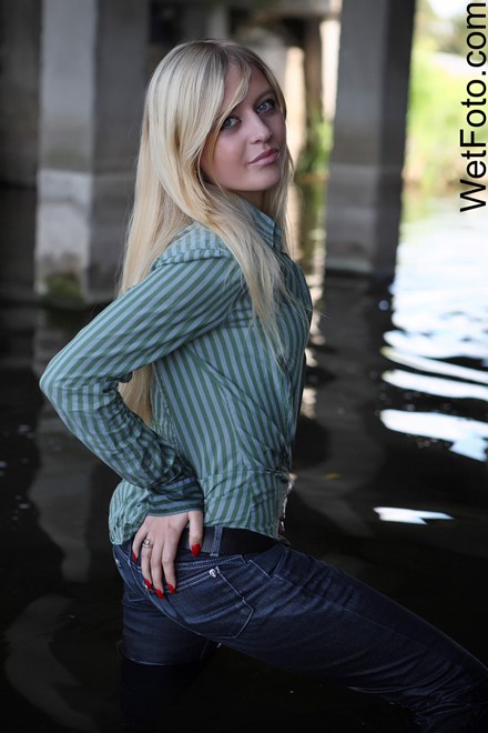 wet girl get wet wet hair fully clothed jeans shirt shoes river