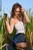 wet girl get wet wet hair fully clothed boleros shorts t-shirt leggings high heels lake