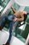 wet girl get wet wet hair fully clothed jeans jacket boots blouse jacuzzi