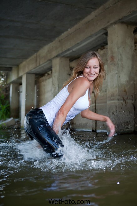 wet girl get wet wet hair fully clothed tight jeans t-shirt shoes lake