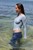brunette wet girl get wet wet hair fully clothed blouse jeans high heels shoes leather sea