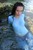 brunette wet girl get wet wet hair fully clothed blouse jeans high heels shoes leather sea
