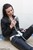 brunette wet girl get wet fully clothed t-shirt jacket jeans high-heeled shoes wet hair pool