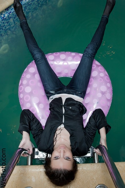 brunette wet girl get wet fully clothed t-shirt jacket jeans high-heeled shoes wet hair pool