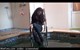 brunette wet girl get wet fully clothed t-shirt jacket jeans high-heeled shoes wet hair pool