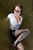 brunette wet woman get wet wet hair fully clothed shirt skirt stockings high heels glasses notebook river
