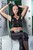 wet girl get wet wet hair fully clothed leggings blouse gloves leather stockings high heels jacuzzi
