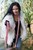 wet girl get wet wet hair swim fully clothed fur coat tight jeans t-shirt scarf shoes lake