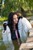 wet girl get wet wet hair swim fully clothed fur coat tight jeans t-shirt scarf shoes lake