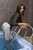 wet girl get wet wet hair jeans blouse bra shoes jacuzzi
