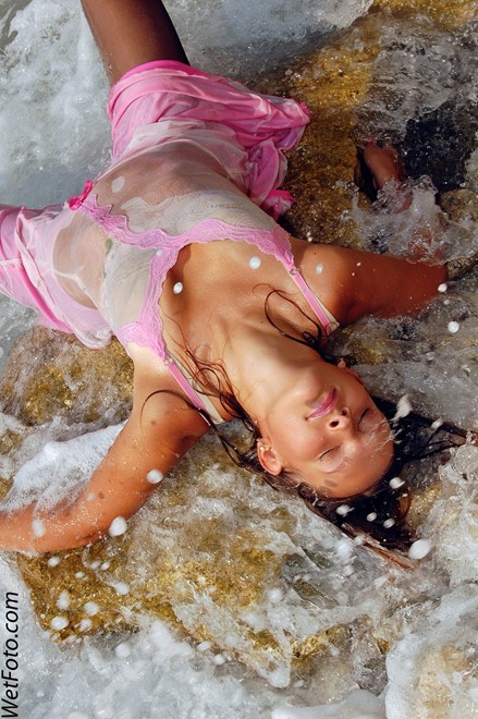 wet girl get wet wet hair swim fully clothed dress stockings leather boots high heels sea