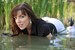 wet girl get wet wet hair swim fully clothed soaking wet pants blouse hat high heels lake