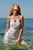 wet girl wet hair get wet swim fully clothed sundress tights leather high-heeled shoes  fully soaked sea