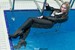 wet girl get wet wet hair swim fully clothed leather jacket guipure blouse leggings shoes pool