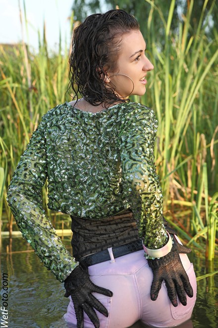 wet girl get wet wet hair swim fully clothed jacket top tight jeans evening gloves high heels lake