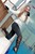 wet girl get wet swim fully clothed wet hair jacket tight jeans sweater boots high heels pool