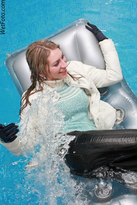 wet girl get wet swim fully clothed wet hair jacket tight jeans sweater boots high heels pool