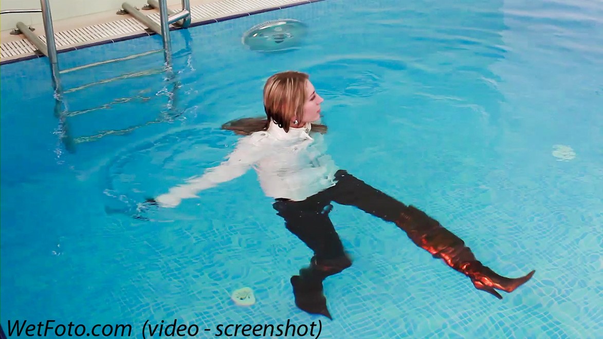 wet girl get wet swim fully clothed wet hair jacket tight jeans sweater boots high heels pool