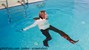 wet girl get wet swim fully clothed wet hair jacket tight jeans sweater boots high heels pool