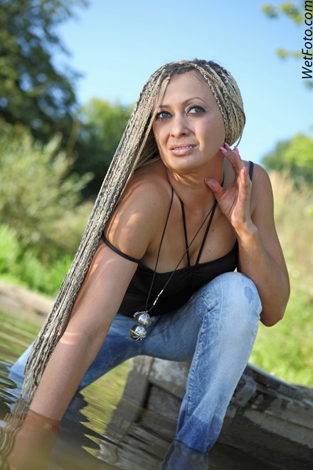 wet girl get wet wet hair swim fully clothed top jeans high heels shoes lake