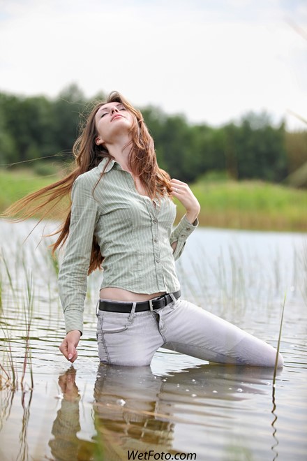 wet girl get wet wet hair swim fully clothed shirt jeans shoes river