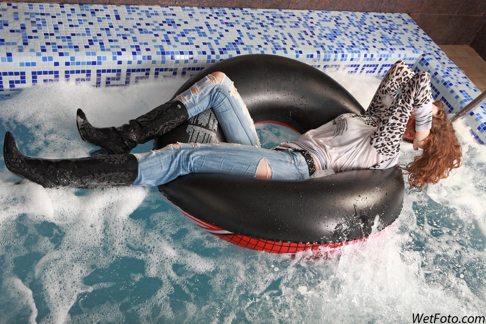 wet girl get wet wet hair swim fully clothed jeans sweater high heels boots leather pool