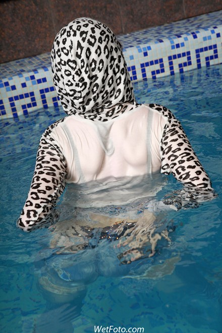 wet girl get wet wet hair swim fully clothed jeans sweater high heels boots leather pool