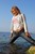 wet girl wet hair get wet swim fully clothed t-shirt jacket tight jeans high heels sandals fully soaked sea