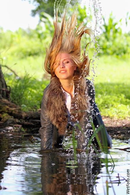 wet girl get wet wet hair swim fully clothed leather jacket fur jeans shirt high heels shoes lake
