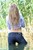 wet girl get wet wet hair swim fully clothed leather jacket fur jeans shirt high heels shoes lake