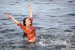 wet girl get wet wet hair swim fully clothed shirt leggings sexy high heels shoes sea