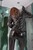wet girl get wet fully clothed leather jacket leggings gloves tights high heels jacuzzi bath