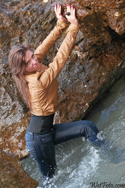 wet girl get wet wet hair swim fully clothed leather jacket tight jeans stockings high hells boots sea
