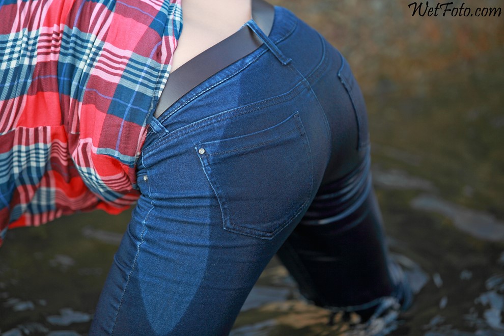 wet girl get wet wet hair fully clothed tight jeans shirt sea