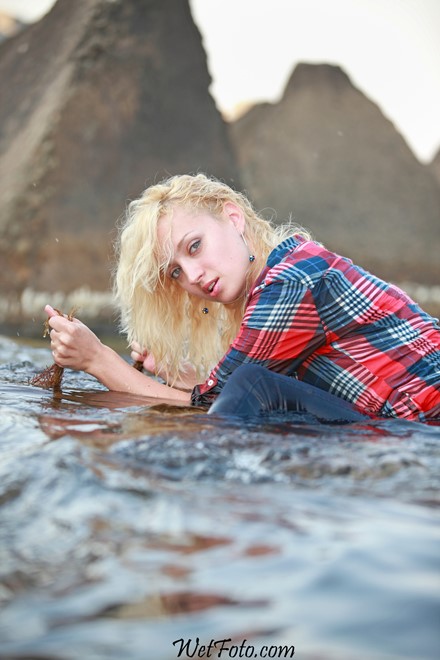 wet girl get wet wet hair fully clothed tight jeans shirt sea