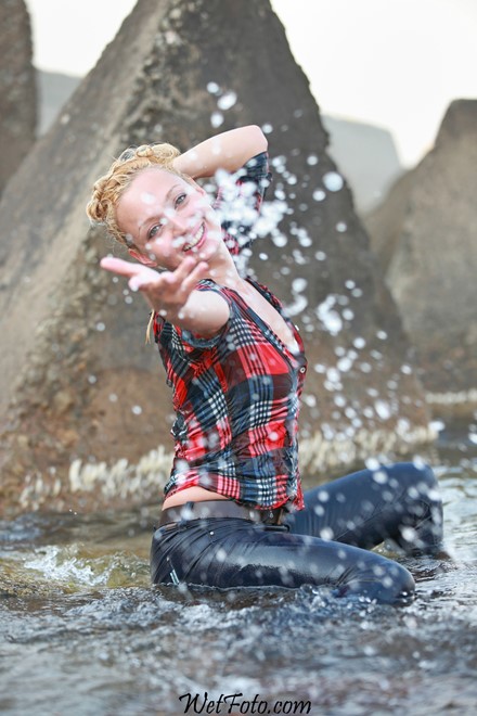 wet girl get wet wet hair fully clothed tight jeans shirt sea