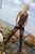 wet girl get wet fully clothed t-shirt mini skirt stockings leather jackboots sea