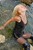 wet girl get wet fully clothed t-shirt mini skirt stockings leather jackboots sea
