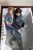 wet girl get wet wet hair swim fully clothed jacket leggings high heels boots sea
