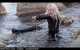 blonde wet girl get wet fully clothed jacket leggingshigh heels boots wet hair sea