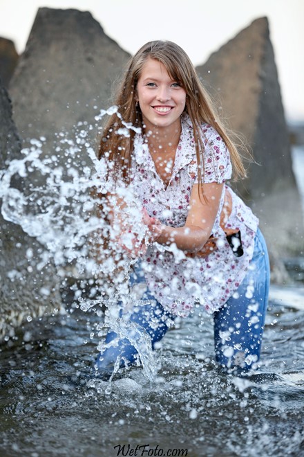 wet girl get wet wet hair jeans blouse high heels sandals sea