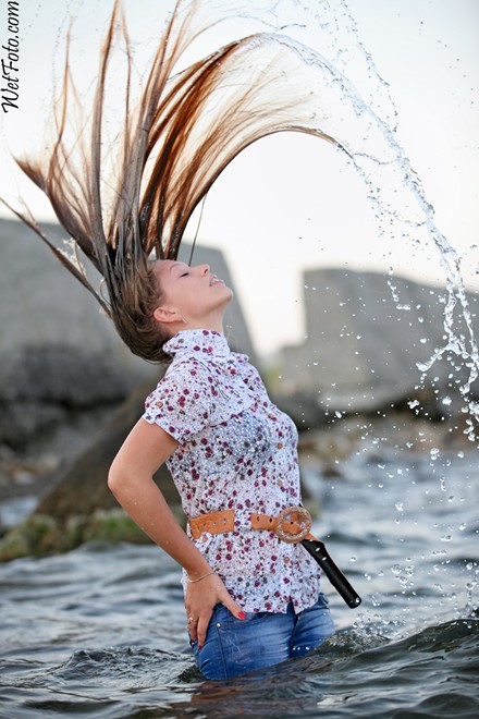 wet girl get wet wet hair jeans blouse high heels sandals sea