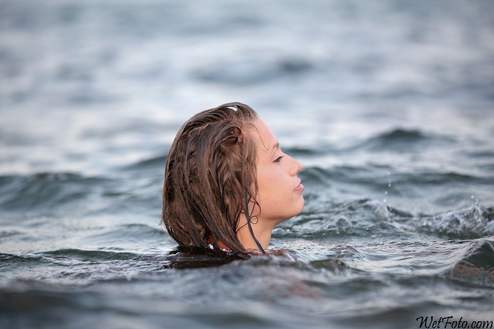 wet girl get wet wet hair jeans blouse high heels sandals sea