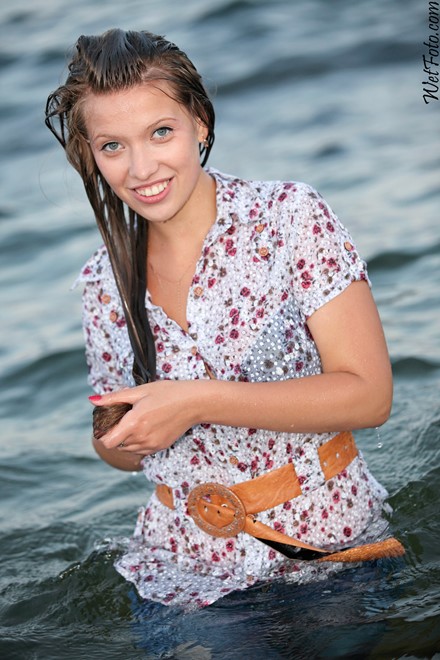 wet girl get wet wet hair jeans blouse high heels sandals sea